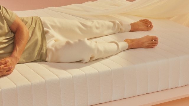 Person lays on mattress